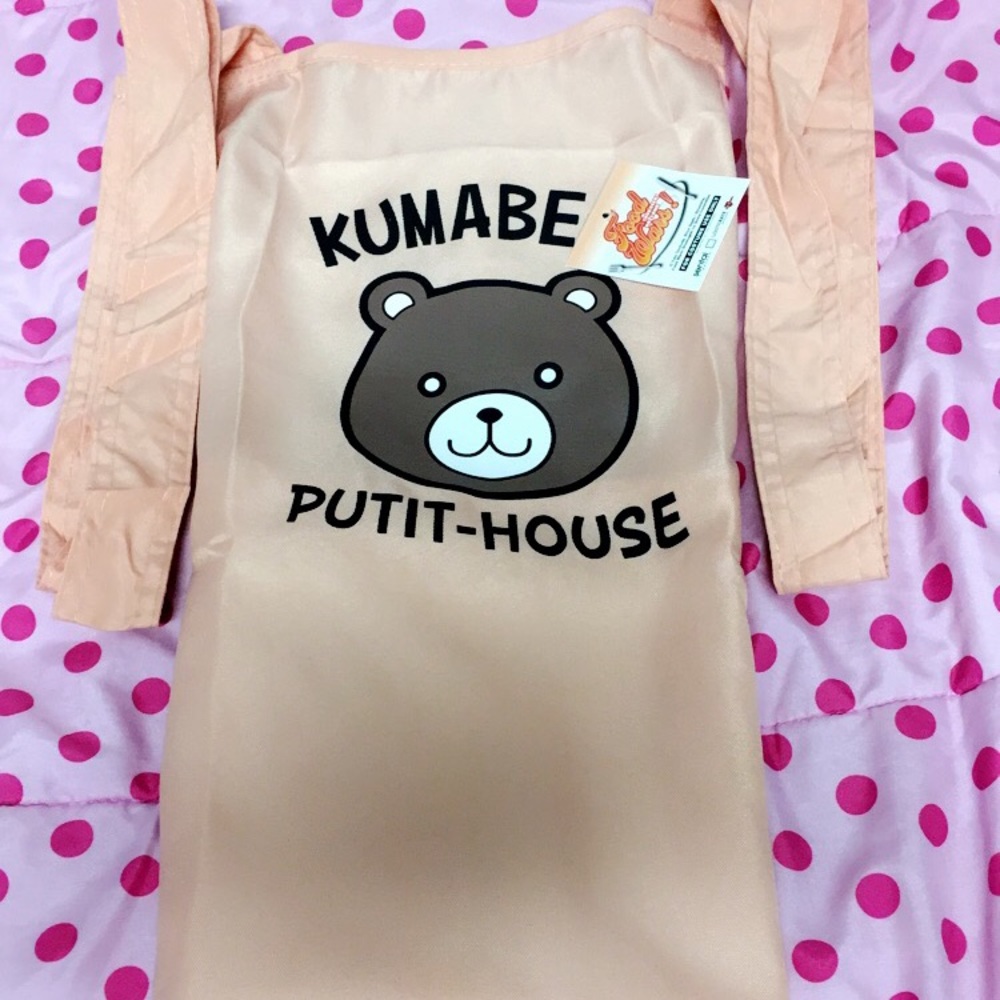 Kawaii aprint of a anime bear cooking.